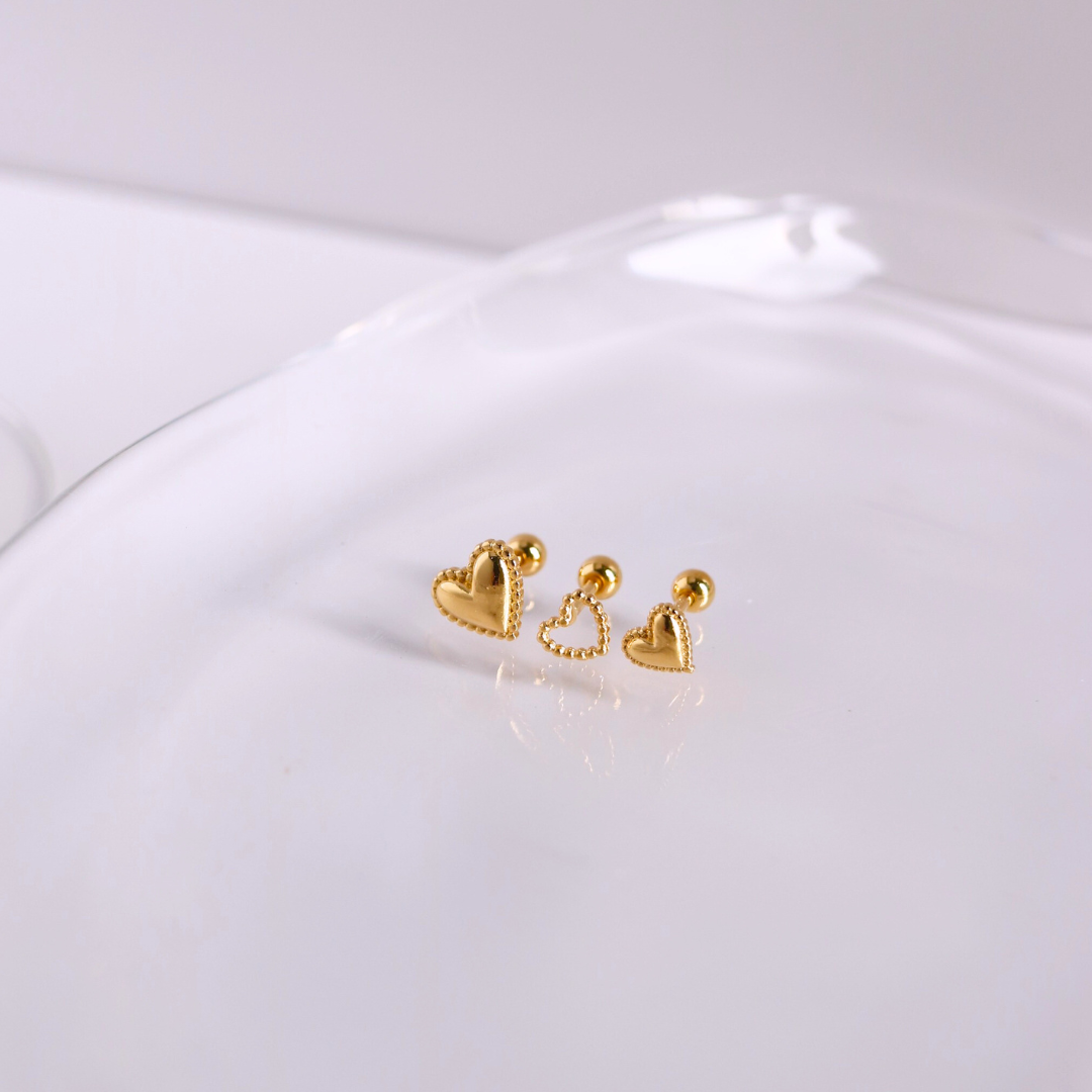 Golden heartbeat piercing