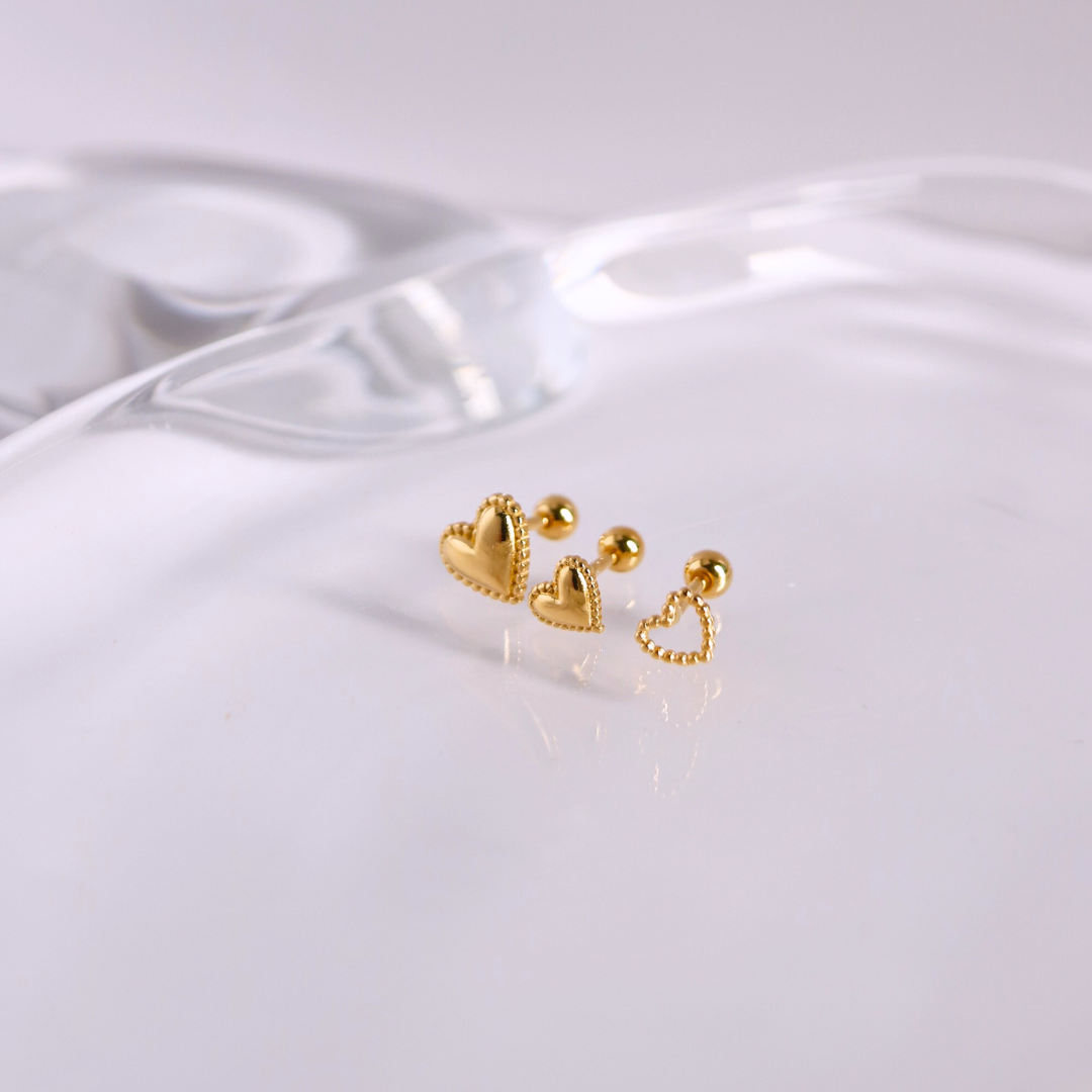 Golden heartbeat piercing
