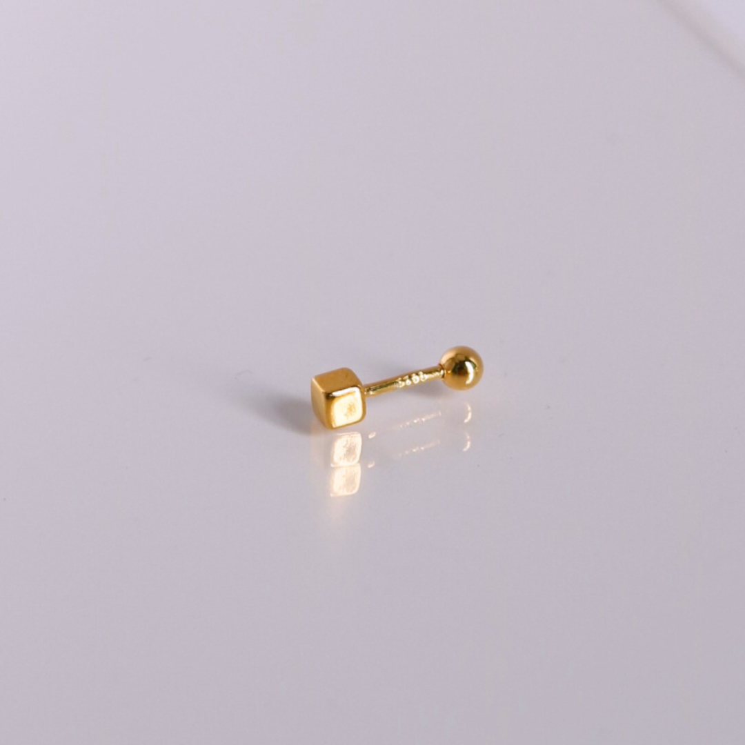Golden cube piercing