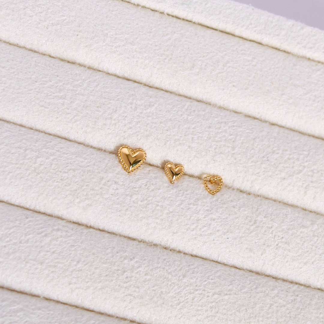Golden heartbeat piercing