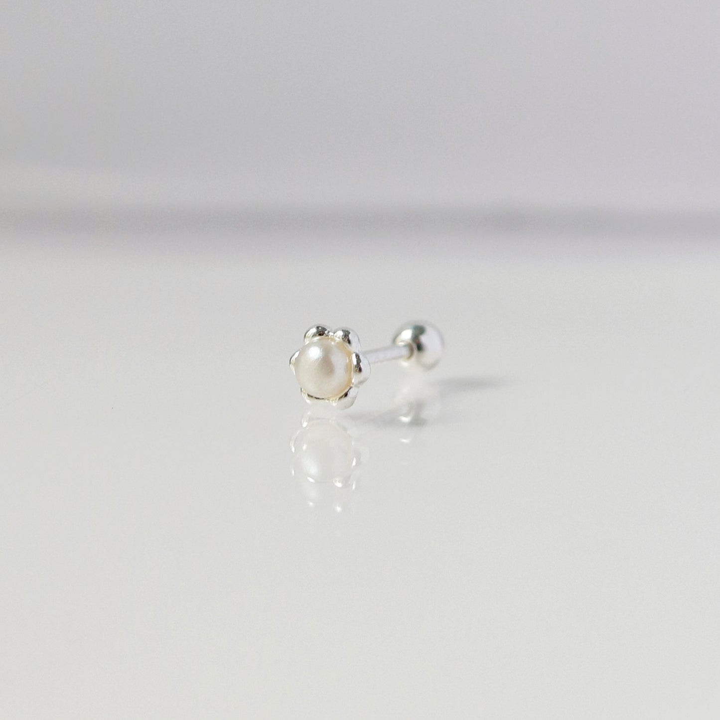 Blossom pearl piercing