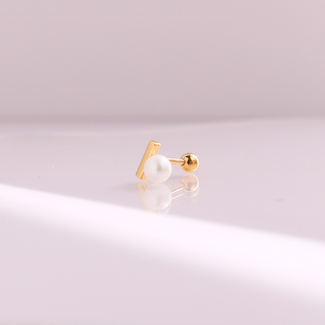 Pearl bar piercing
