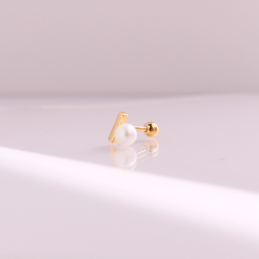 Pearl bar piercing