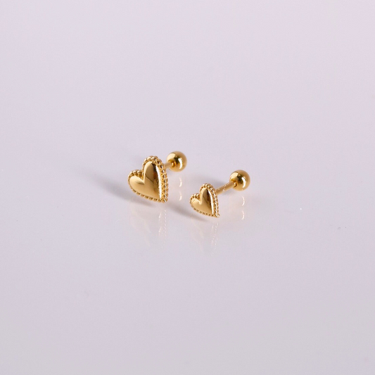 Golden heartbeat piercing