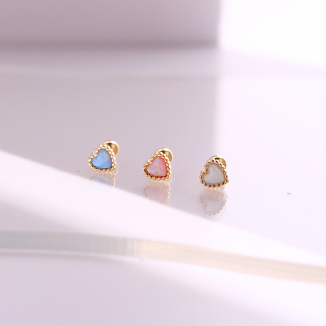Opal heart piercing