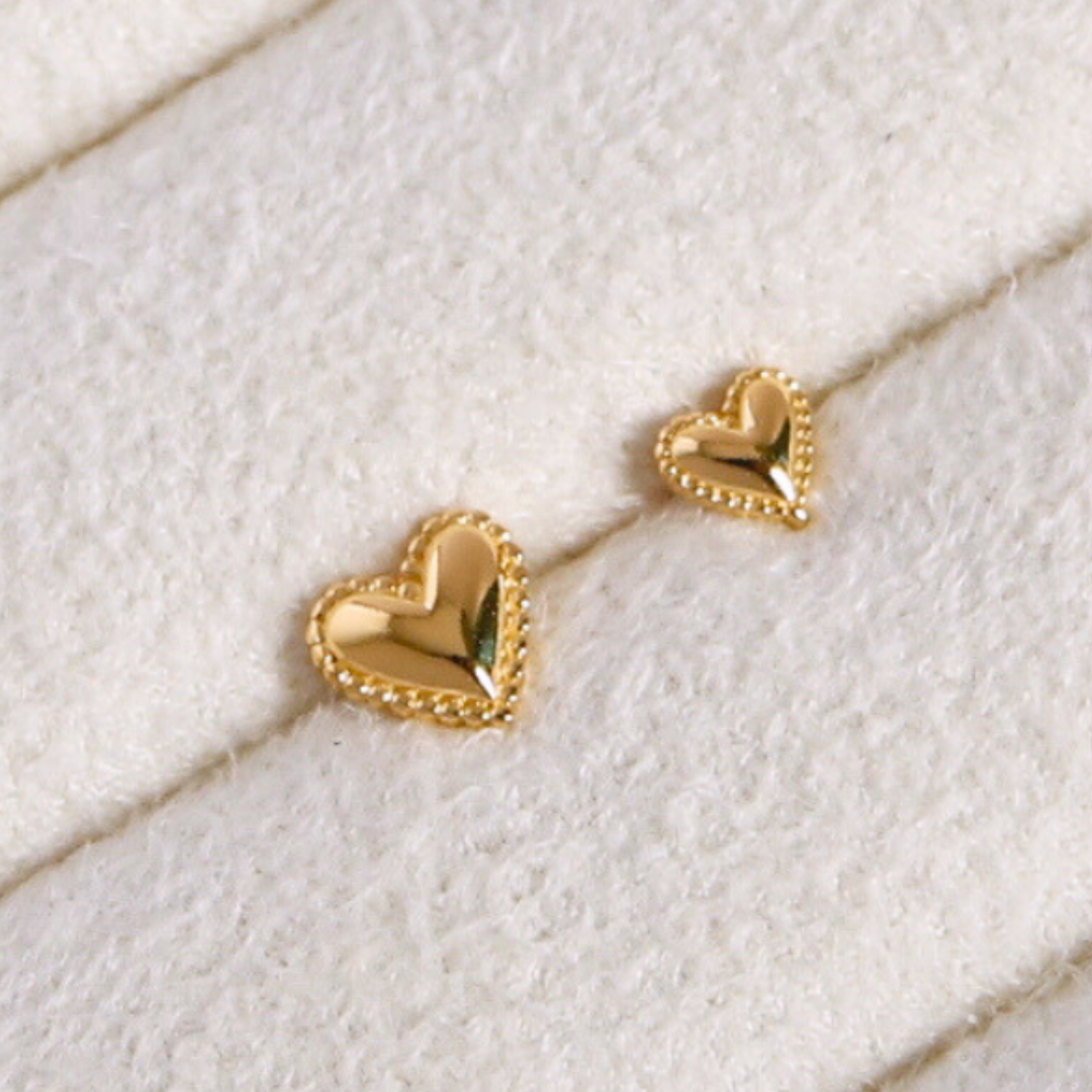 Golden heartbeat piercing