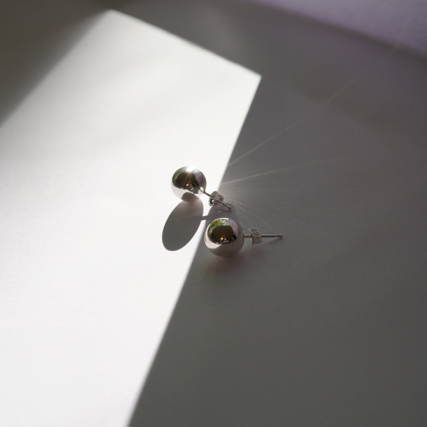 Essential silver studs