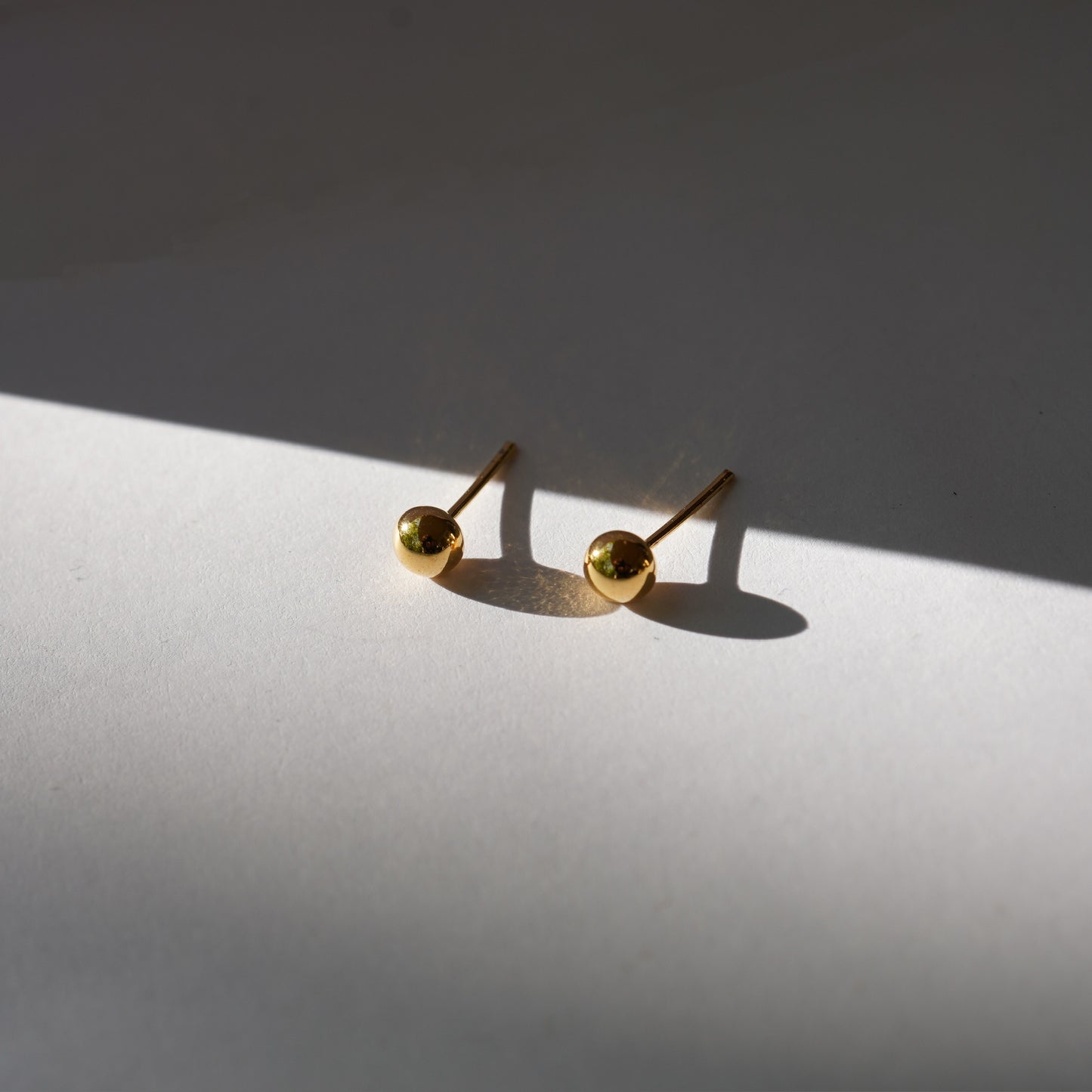 Essential gold studs
