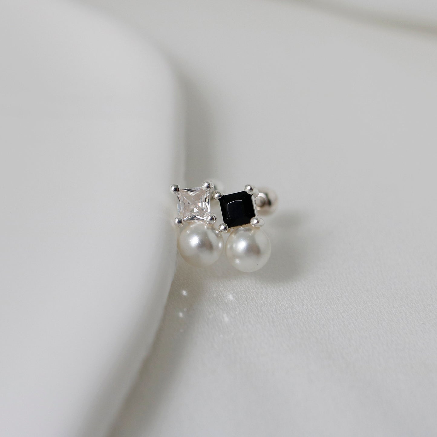 Midnight pearls piercing
