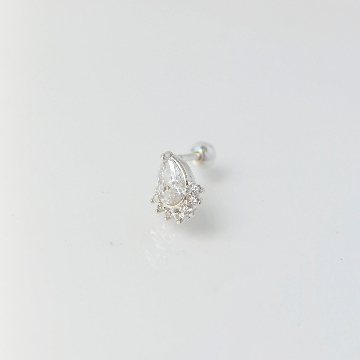 Dreamscape teardrop piercing