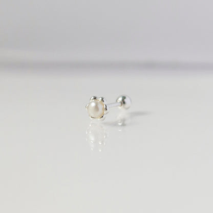 Blossom pearl piercing