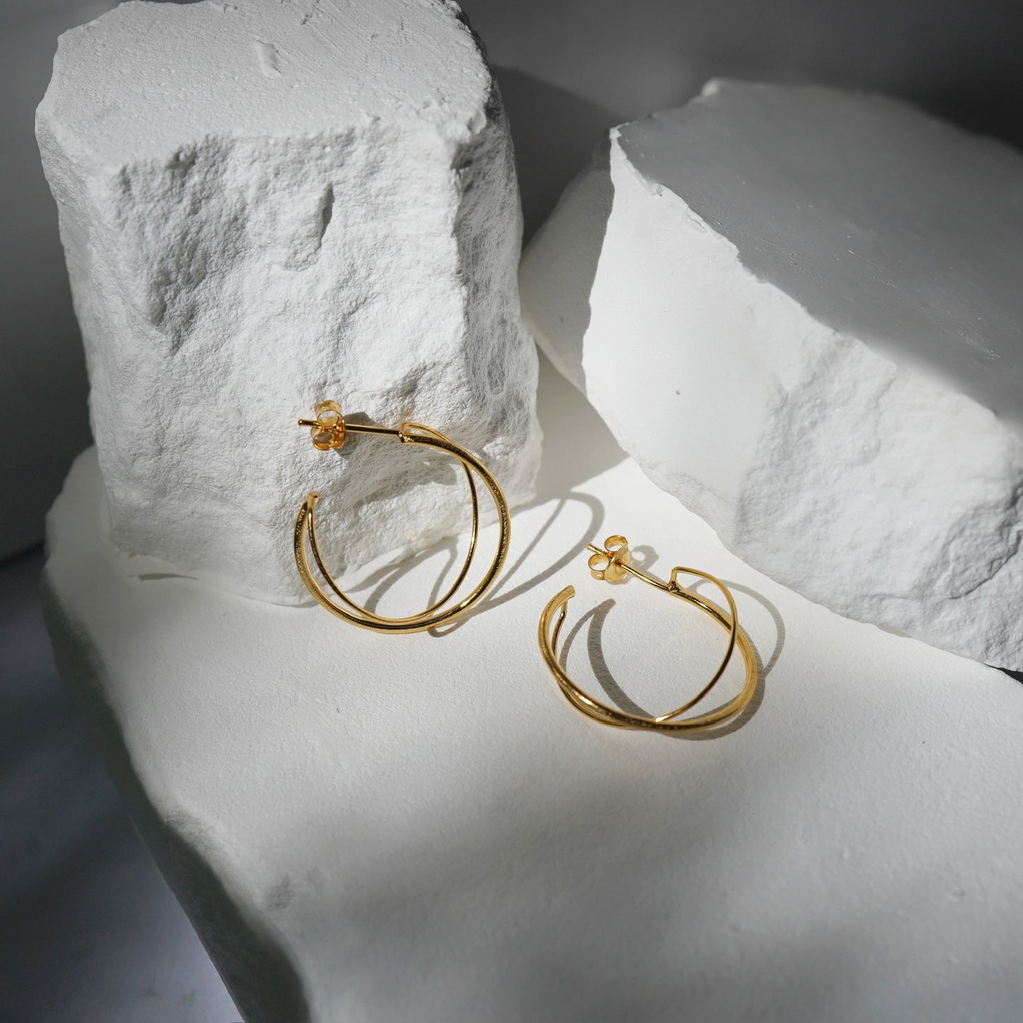 Gravity double loop earrings