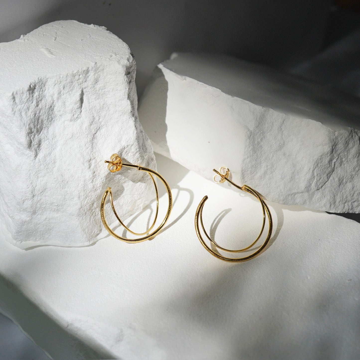 Gravity double loop earrings