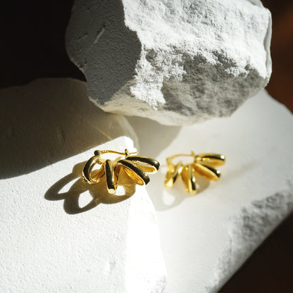 Gold sunburst earrings