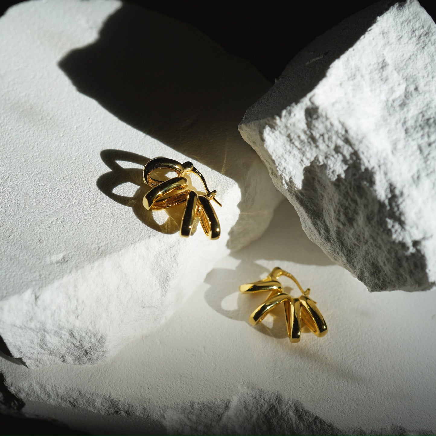 Gold sunburst earrings